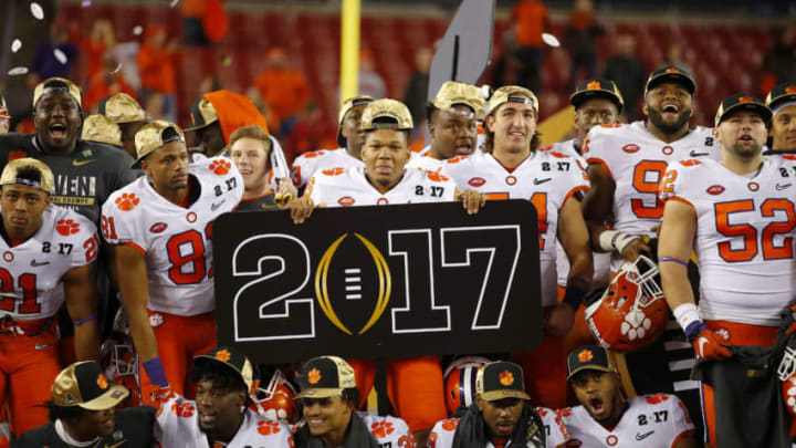TAMPA, FL - JANUARY 09: The Clemson Tigers celebrate during the trophy presentation at the conclusion of the National Championship game against the Alabama Crimson Tide on January 9, 2017, at Raymond James Stadium in Tampa, FL. Clemson beat Alabama 35-31. (Photo by Todd Kirkland/Icon Sportswire via Getty Images)