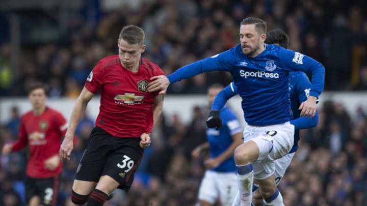 LIVERPOOL, ENGLAND - MARCH 01: Scott McTominay of Manchester United in action with Gylfi Sigurdsson of Everton in action during the Premier League match between Everton FC and Manchester United at Goodison Park on March 01, 2020 in Liverpool, United Kingdom. (Photo by Visionhaus)