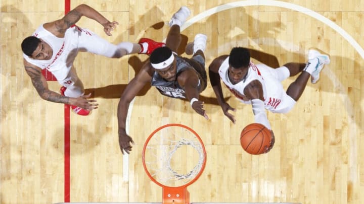 DAYTON, OH - NOVEMBER 30: Dwayne Cohill #35 of the Dayton Flyers drives to the basket against Aric Holman #35 of the Mississippi State Bulldogs in the second half of the game at UD Arena on November 30, 2018 in Dayton, Ohio. The Bulldogs won 65-58. (Photo by Joe Robbins/Getty Images)
