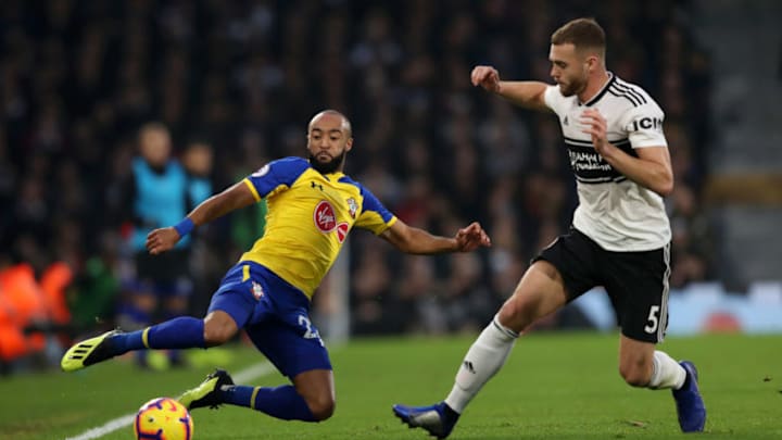 LONDON, ENGLAND - NOVEMBER 24: Nathan Redmond of Southampton keeps the ball in play under pressure from Calum Chambers of Fulham during the Premier League match between Fulham FC and Southampton FC at Craven Cottage on November 24, 2018 in London, United Kingdom. (Photo by Christopher Lee/Getty Images)