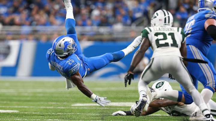 DETROIT, MI - SEPTEMBER 10: Theo Riddick #25 of the Detroit Lions flies through the air after being tackled by Darron Lee #58 of the New York Jets at Ford Field on September 10, 2018 in Detroit, Michigan. (Photo by Rey Del Rio/Getty Images)