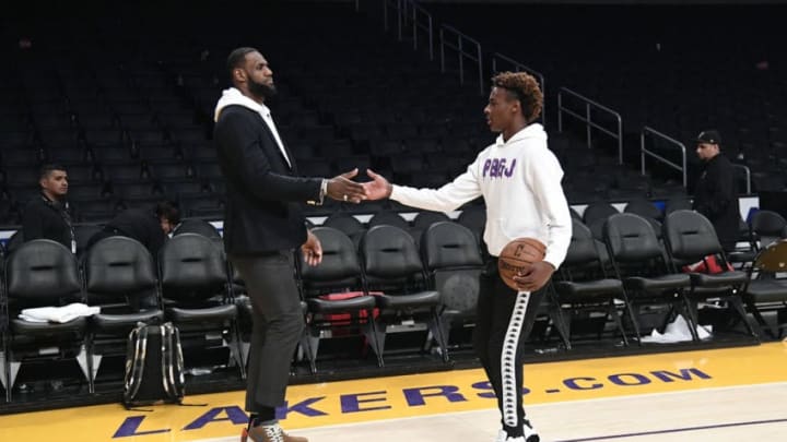 LOS ANGELES, CA - DECEMBER 28: LeBron James #23 of the Los Angeles Lakers and his son LeBron James Jr., on the court after the Los Angeles Clippers and Los Angeles Lakers basketball game at Staples Center on December 28, 2018 in Los Angeles, California. NOTE TO USER: User expressly acknowledges and agrees that, by downloading and or using this photograph, User is consenting to the terms and conditions of the Getty Images License Agreement. (Photo by Kevork Djansezian/Getty Images)