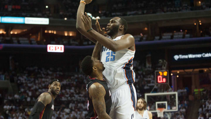 Apr 26, 2014; Charlotte, NC, USA;Charlotte Bobcats center Al Jefferson (25) shoots the ball over Miami Heat forward Udonis Haslem (40) during the second half in game three of the first round of the 2014 NBA Playoffs at Time Warner Cable Arena. The Heat defeated the Bobcats 98-85. Mandatory Credit: Jeremy Brevard-USA TODAY Sports