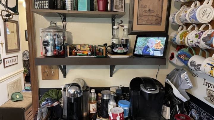 The Central Perk Lego set sits on a coffee bar shelf after completion. Image courtesy Brian Miller