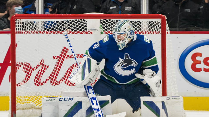 Dec 6, 2021; Vancouver, British Columbia, CAN; Vancouver Canucks goalie Thatcher Demko (35) makes a save against the Los Angeles Kings in the third period at Rogers Arena. Vancouver won 4-0. Mandatory Credit: Bob Frid-USA TODAY Sports