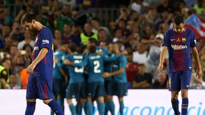 BARCELONA, SPAIN - AUGUST 13: Lionel Messi of Barcelona reacts during the Supercopa de Espana Supercopa Final 1st Leg match between FC Barcelona and Real Madrid at Camp Nou on August 13, 2017 in Barcelona, Spain. (Photo by Manuel Queimadelos Alonso/Getty Images,)