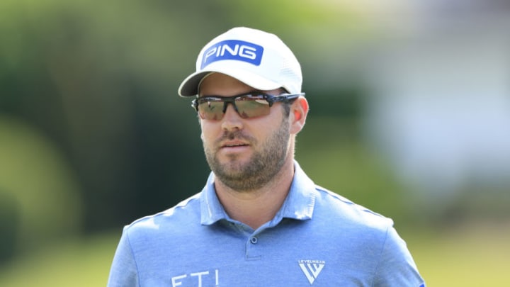 ORLANDO, FLORIDA - MARCH 04: Corey Conners of Canada looks on as he walks off the 17th green during the first round of the Arnold Palmer Invitational Presented by MasterCard at the Bay Hill Club and Lodge on March 04, 2021 in Orlando, Florida. (Photo by Sam Greenwood/Getty Images)