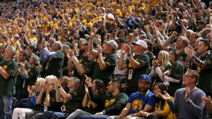 SALT LAKE CITY, UT - MAY 6: Fans of the Utah Jazz celebrate after scoring during the game against the Golden State Warriors during Game Three of the Western Conference Semifinals of the 2017 NBA Playoffs on May 6, 2017 at vivint.SmartHome Arena in Salt Lake City, Utah. NOTE TO USER: User expressly acknowledges and agrees that, by downloading and/or using this Photograph, user is consenting to the terms and conditions of the Getty Images License Agreement. Mandatory Copyright Notice: Copyright 2017 NBAE (Photo by Melissa Majchrzak/NBAE via Getty Images)