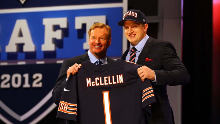 NEW YORK, NY – APRIL 26: Shea McClellin (R) of Boise State holds up a jersey as he stands on stage with NFL Commissioner Roger Goodell after he was selected #19 overall by the Chicago Bears in the first round of the 2012 NFL Draft at Radio City Music Hall on April 26, 2012 in New York City. (Photo by Al Bello/Getty Images)