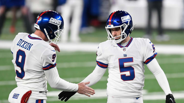 EAST RUTHERFORD, NEW JERSEY – NOVEMBER 02: Graham Gano #5 of the New York Giants reacts after converting a field goal in the second half against the Tampa Bay Buccaneers with Riley Dixon #9 at MetLife Stadium on November 02, 2020 in East Rutherford, New Jersey. (Photo by Sarah Stier/Getty Images)