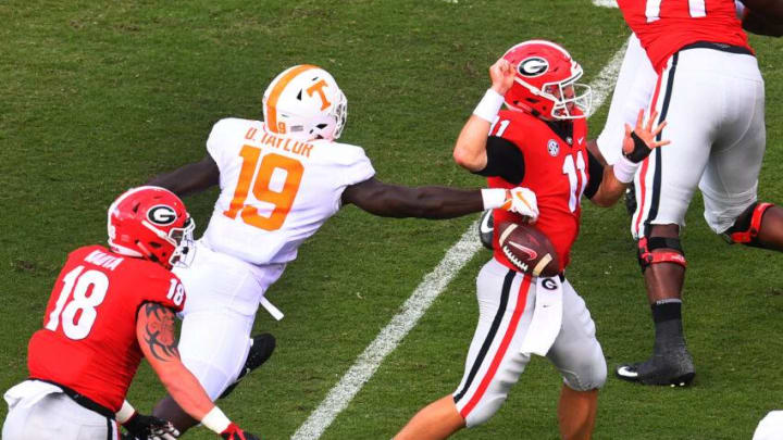 ATHENS, GA - SEPTEMBER 29: Darrell Taylor #19 of the Tennessee Volunteers strips the ball from Jake Fromm #11 of the Georgia Bulldogs on September 29, 2018 at Sanford Stadium in Athens, Georgia. (Photo by Scott Cunningham/Getty Images)