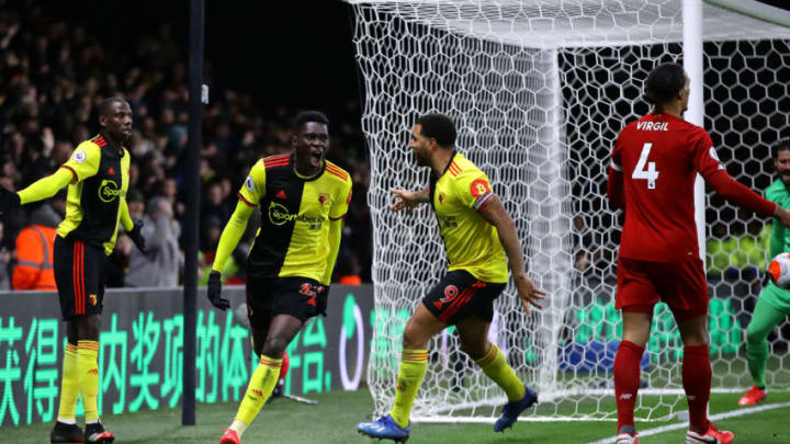 WATFORD, ENGLAND - FEBRUARY 29: Ismaila Sarr of Watford celebrates with teammates after scoring his team's first goal during the Premier League match between Watford FC and Liverpool FC at Vicarage Road on February 29, 2020 in Watford, United Kingdom. (Photo by Richard Heathcote/Getty Images)