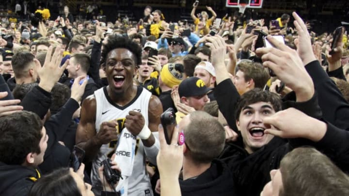 IOWA CITY, IOWA- FEBRUARY 01: Forward Tyler Cook #25 of the Iowa Hawkeyes celebrates with fans after the upset over the Michigan Wolverines on February 1, 2019 at Carver-Hawkeye Arena, in Iowa City, Iowa. (Photo by Matthew Holst/Getty Images)