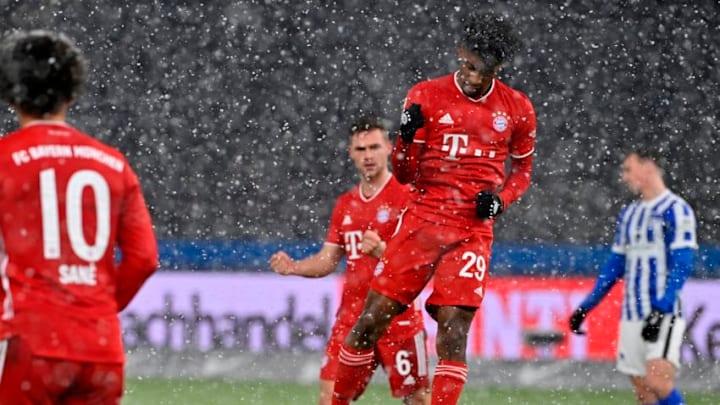 Kingsley Coman celebrating after scoring for Bayern Munich against Hertha Berlin. (Photo by JOHN MACDOUGALL/POOL/AFP via Getty Images)