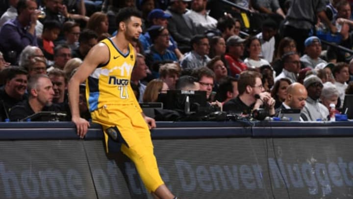 DENVER, CO – DECEMBER 30: Jamal Murray #27 of the Denver Nuggets looks on during the game against the Philadelphia 76ers on December 30, 2017 at the Pepsi Center in Denver, Colorado. NOTE TO USER: User expressly acknowledges and agrees that, by downloading and/or using this Photograph, user is consenting to the terms and conditions of the Getty Images License Agreement. Mandatory Copyright Notice: Copyright 2017 NBAE (Photo by Garrett Ellwood/NBAE via Getty Images)
