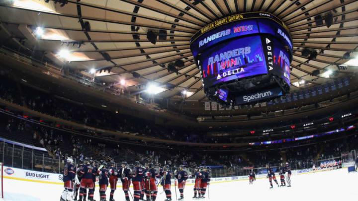 NEW YORK, NEW YORK - MARCH 17: The New York Rangers celebrate their 9-0 victory over the Philadelphia Flyers at Madison Square Garden on March 17, 2021 in New York City. (Photo by Bruce Bennett/Getty Images)