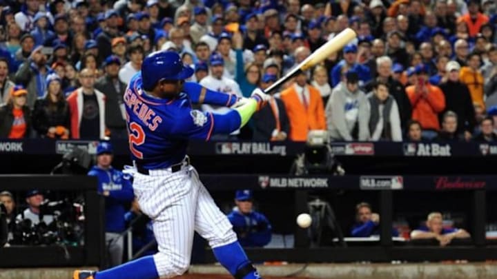 Nov 1, 2015; New York City, NY, USA; New York Mets center fielder Yoenis Cespedes fouls a ball off his knee in the 6th inning against the Kansas City Royals in game five of the World Series at Citi Field. The Royals win the World Series four games to one. Mandatory Credit: Jeff Curry-USA TODAY Sports