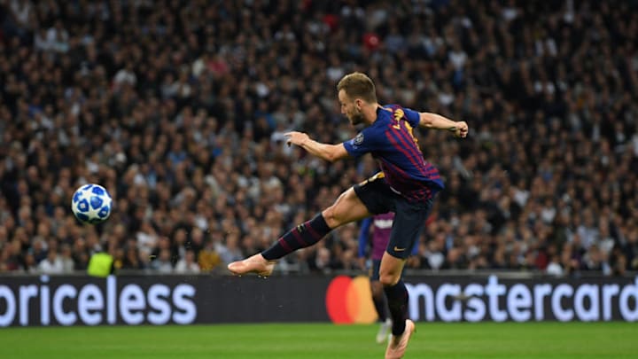 LONDON, ENGLAND - OCTOBER 03: Ivan Rakitic of Barcelona scores his team's second goal during the Group B match of the UEFA Champions League between Tottenham Hotspur and FC Barcelona at Wembley Stadium on October 03, 2018 in London, United Kingdom. (Photo by Shaun Botterill/Getty Images)