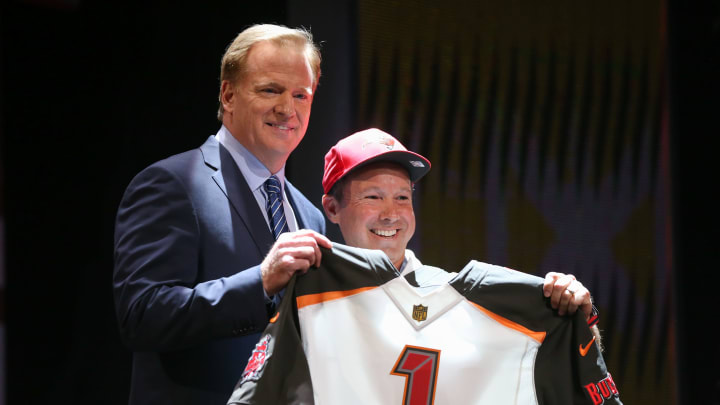 CHICAGO, IL – APRIL 30: NFL Commissioner Roger Goodell holds up a jersey after the Tampa Bay Buccaneers chose Jameis Winston of the Florida State Seminoles