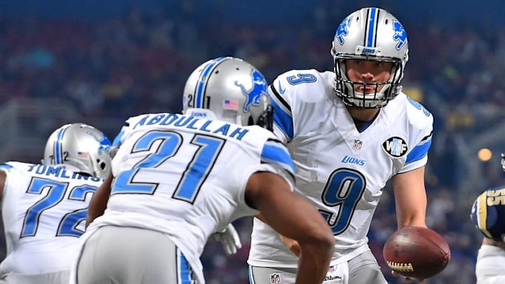 Dec 13, 2015; St. Louis, MO, USA; Detroit Lions quarterback Matthew Stafford (9) hands the ball off to Detroit Lions running back Ameer Abdullah (21) against the St. Louis Rams during the first half at the Edward Jones Dome. Mandatory Credit: Jasen Vinlove-USA TODAY Sports