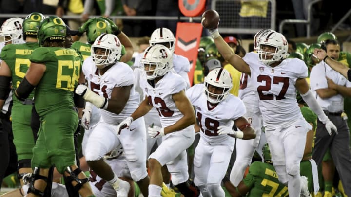 EUGENE, OR - SEPTEMBER 22: Linebacker Sean Barton (27) of the Stanford Cardinal runs off the field with a fumble recovery in the fourth quarter of the game against the Oregon Ducks at Autzen Stadium on September 22, 2018 in Eugene, Oregon. Stanford won the game in overtime 38-31. (Photo by Steve Dykes/Getty Images)
