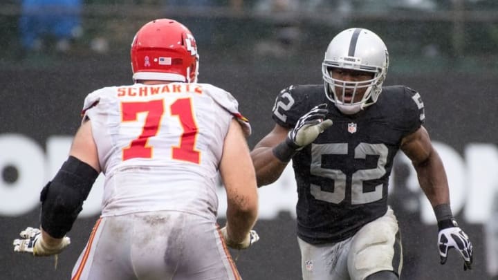 October 16, 2016; Oakland, CA, USA; Oakland Raiders defensive end Khalil Mack (52) rushes against Kansas City Chiefs offensive tackle Mitchell Schwartz (71) during the fourth quarter at Oakland Coliseum. The Chiefs defeated the Raiders 26-10. Mandatory Credit: Kyle Terada-USA TODAY Sports October 16, 2016; Oakland, CA, USA; Oakland Raiders defensive end Khalil Mack (52) rushes against Kansas City Chiefs offensive tackle Mitchell Schwartz (71) during the fourth quarter at Oakland Coliseum. The Chiefs defeated the Raiders 26-10. Mandatory Credit: Kyle Terada-USA TODAY Sports