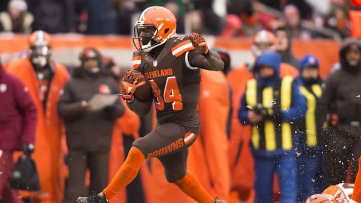 Dec 11, 2016; Cleveland, OH, USA; Cleveland Browns running back Isaiah Crowell (34) runs the ball for a first down against the Cincinnati Bengals during the third quarter at FirstEnergy Stadium. The Bengals won 23-10. Mandatory Credit: Scott R. Galvin-USA TODAY Sports