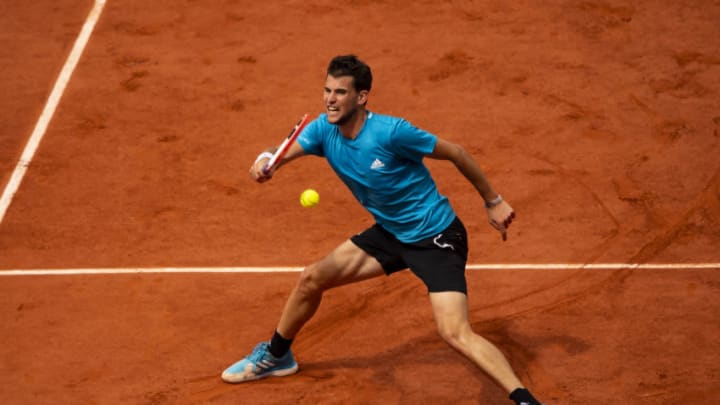 PARIS, FRANCE - JUNE 09: Dominic Thiem of Austria hits a forehand against Rafael Nadal of Spain in the final of the men's singles during Day 15 of the 2019 French Open at Roland Garros on June 09, 2019 in Paris, France. (Photo by TPN/Getty Images)