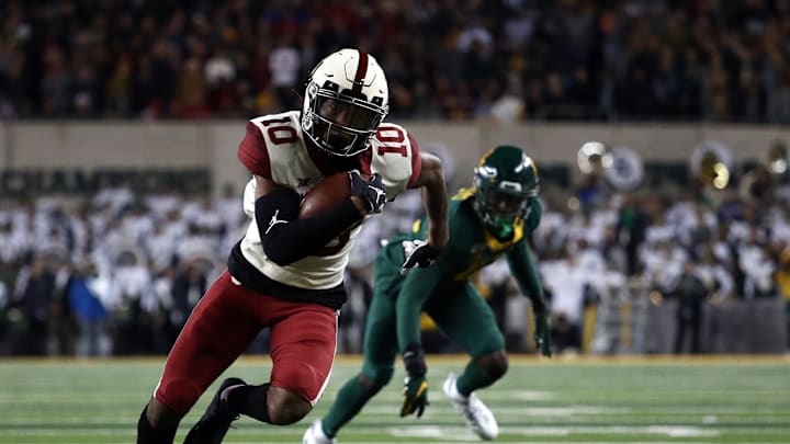 WACO, TEXAS – NOVEMBER 16: Theo Wease #10 of the Oklahoma Sooners runs for a touchdown against the Baylor Bears in the second half at McLane Stadium on November 16, 2019 in Waco, Texas. (Photo by Ronald Martinez/Getty Images)