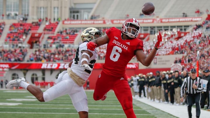 BLOOMINGTON, IN - NOVEMBER 24: James Head Jr. #6 of the Indiana Hoosiers reaches for the ball that would eventually fall incomplete as Tim Cason #24 of the Purdue Boilermakers defends at Memorial Stadium on November 24, 2018 in Bloomington, Indiana. (Photo by Michael Hickey/Getty Images)