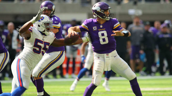 MINNEAPOLIS, MN - SEPTEMBER 23: Jerry Hughes #55 of the Buffalo Bills pursues Kirk Cousins #8 of the Minnesota Vikings as he passes the ball in the third quarter of the game at U.S. Bank Stadium on September 23, 2018 in Minneapolis, Minnesota. (Photo by Adam Bettcher/Getty Images)