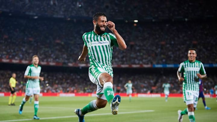 BARCELONA, SPAIN - AUGUST 25: Nabil Fekir of Real Betis celebrates scoring his team's opening goal with team mates during the Liga match between FC Barcelona and Real Betis Balompie at Camp Nou on August 25, 2019 in Barcelona, Spain. (Photo by Quality Sport Images/Getty Images)