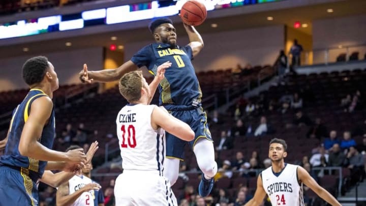 Nov 27, 2015; Las Vegas, NV, USA; California Golden Bears forward Jaylen Brown (0) flies through the air to dunk the ball while Richmond Spiders forward TJ Cline (10) defends during the first half at Orleans Arena. Mandatory Credit: Joshua Dahl-USA TODAY Sports