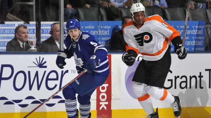 TORONTO, CANADA - MARCH 29: Colby Armstrong #9 of the Toronto Maple Leafs skates with Wayne Simmonds #17 of the Philadelphia Flyers during NHL game action March 29, 2012 at the Air Canada Centre in Toronto, Ontario, Canada. (Photo by Graig Abel/NHLI via Getty Images)