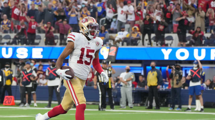 Jan 9, 2022; Inglewood, California, USA; San Francisco 49ers wide receiver Jauan Jennings (15) scores a touchdown against the Los Angeles Rams in the fourth quarter at SoFi Stadium. Mandatory Credit: Kirby Lee-USA TODAY Sports