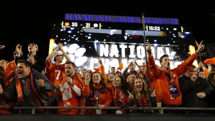 Jan 9, 2017; Tampa, FL, USA; Clemson Tigers fans celebrate after defeating the Alabama Crimson Tide in the 2017 College Football Playoff National Championship Game at Raymond James Stadium. Mandatory Credit: Kim Klement-USA TODAY Sports
