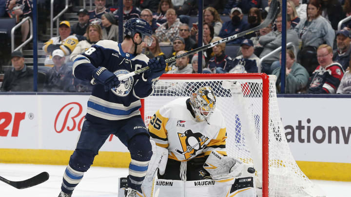 Nov 14, 2023; Columbus, Ohio, USA; Columbus Blue Jackets right wing Yegor Chinakhov’s (59) shot (not pictured) eludes Pittsburgh Penguins goalie Tristan Jarry (35) for a gaol during the first period at Nationwide Arena. Mandatory Credit: Russell LaBounty-USA TODAY Sports