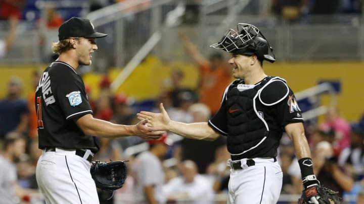 MIAMI, FL – SEPTEMBER 22: Relief pitcher Drew Steckenrider #71 of the Miami Marlins celebrates with catcher J.T. Realmuto #11 after the Marlins defeated the Cincinnati Reds 5-1 at Marlins Park on September 22, 2018 in Miami, Florida. (Photo by Joe Skipper/Getty Images)