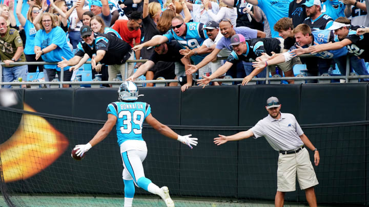 CHARLOTTE, NORTH CAROLINA – OCTOBER 06: Reggie Bonnafon #39 of the Carolina Panthers reacts with fans after scoring a touchdown in the fourth quarter during their game against the Jacksonville Jaguars at Bank of America Stadium on October 06, 2019 in Charlotte, North Carolina. (Photo by Jacob Kupferman/Getty Images)