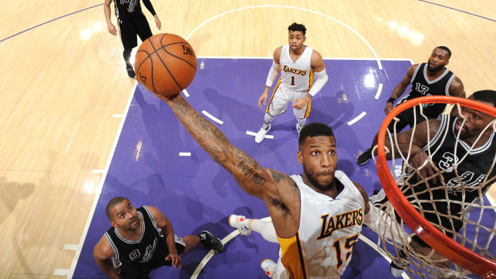 LOS ANGELES, CA – FEBRUARY 26: Thomas Robinson #15 of the Los Angeles Lakers goes for the dunk during the game against the San Antonio Spurs on February 26, 2017 at STAPLES Center in Los Angeles, California. NOTE TO USER: User expressly acknowledges and agrees that, by downloading and/or using this Photograph, user is consenting to the terms and conditions of the Getty Images License Agreement. Mandatory Copyright Notice: Copyright 2017 NBAE (Photo by Andrew D. Bernstein/NBAE via Getty Images)