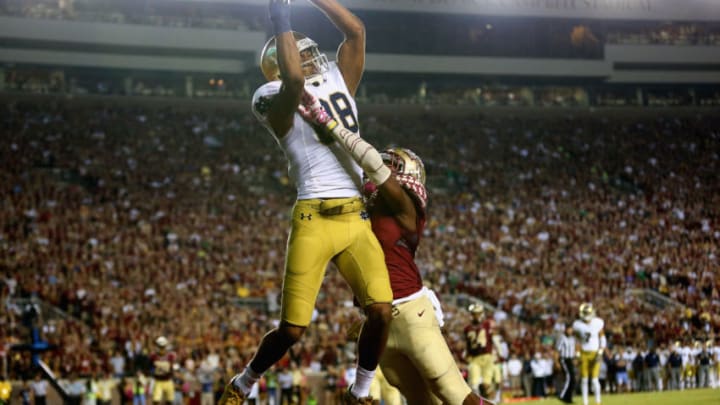 TALLAHASSEE, FL - OCTOBER 18: Corey Robinson #88 of the Notre Dame Fighting Irish catches a touchdown over Jalen Ramsey #8 of the Florida State Seminoles during their game at Doak Campbell Stadium on October 18, 2014 in Tallahassee, Florida. (Photo by Streeter Lecka/Getty Images)