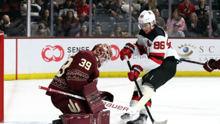 Connor Ingram #39 of the Arizona Coyotes makes a save against Jack Hughes #86 of the New Jersey Devils in the third period at Mullett Arena on March 05, 2023 in Tempe, Arizona. (Photo by Zac BonDurant/Getty Images)