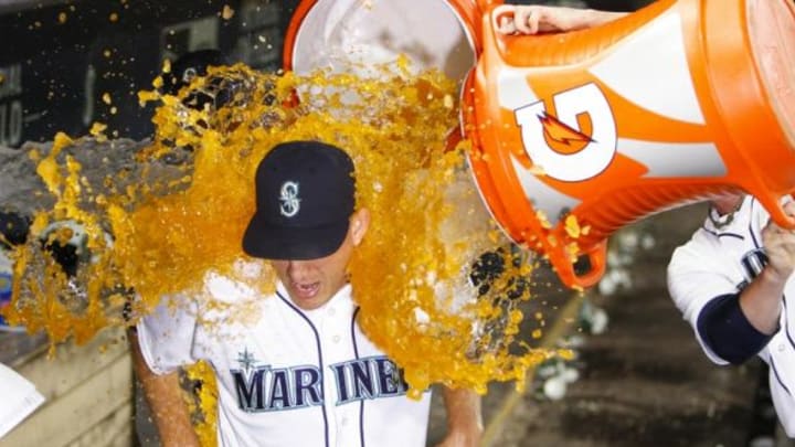 Jun 23, 2015; Seattle, WA, USA; Seattle Mariners pitcher Mike Montgomery (37) is doused with sports drink following a 7-0 complete game victory against the Kansas City Royals at Safeco Field. Mandatory Credit: Joe Nicholson-USA TODAY Sports