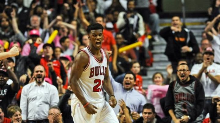 Oct 16, 2014; Chicago, IL, USA; Chicago Bulls guard Jimmy Butler (21) after being fouled by the an Atlanta Hawks player during the second half at the United Center. The Chicago Bulls defeated the Atlanta Hawks 85-84. Mandatory Credit: Matt Marton-USA TODAY Sports