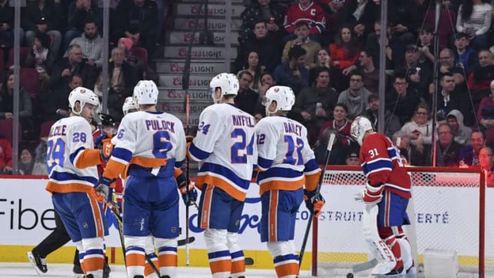 MONTREAL, QC - DECEMBER 3: Mathew Barzal #13 of the New York Islanders celebrates with teammates after scoring a goal against the Montreal Canadiens in the NHL game at the Bell Centre on December 3, 2019 in Montreal, Quebec, Canada. (Photo by Francois Lacasse/NHLI via Getty Images)
