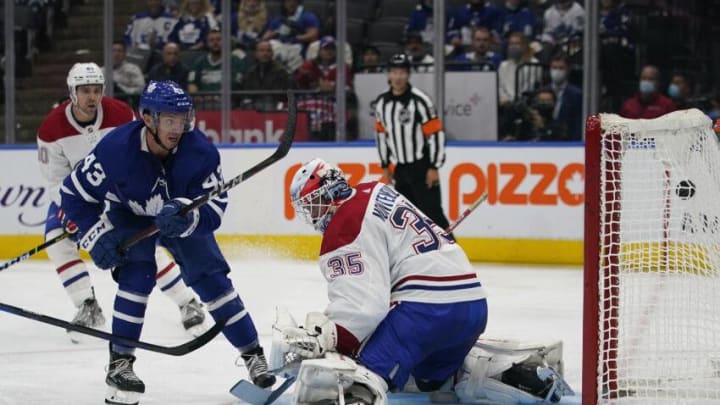 Toronto Maple Leafs forward Brett Seney (43) scores against Montreal Canadiens goaltender Sam Montembeault (35) during the third period at Scotiabank Arena. Mandatory Credit: John E. Sokolowski-USA TODAY Sports