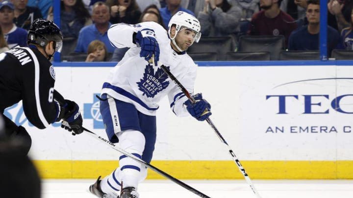 Dec 29, 2016; Tampa, FL, USA; Toronto Maple Leafs center Nazem Kadri (43) shoots as Tampa Bay Lightning defenseman Anton Stralman (6) attempted to defend during the third period at Amalie Arena. Mandatory Credit: Kim Klement-USA TODAY Sports