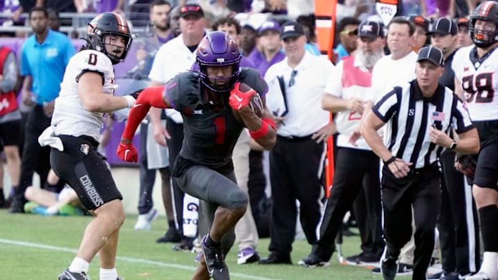 October 15, 2022; Fort Worth, Texas, USA; TCU Horned Frogs wide receiver Quentin Johnston (1) runs after the catch against the Oklahoma State Cowboys during the second half at Amon G. Carter Stadium. Mandatory Credit: Raymond Carlin III-USA TODAY Sports