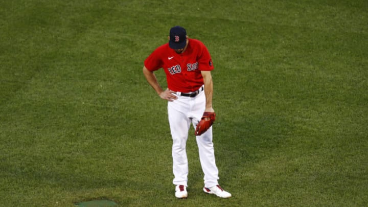 BOSTON, MASSACHUSETTS - MAY 17: Starting pitcher Nathan Eovaldi #17 of the Boston Red Sox reacts during the second inning of the game against the Houston Astros at Fenway Park on May 17, 2022 in Boston, Massachusetts. (Photo by Omar Rawlings/Getty Images)