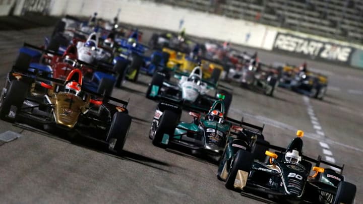 FORT WORTH, TX - AUGUST 27: Ed Carpenter driver of the #20 Fuzzy's Vodka Chevrolet leads a pack of cars during the Verizon IndyCar Series Firestone 600 at Texas Motor Speedway on August 27, 2016 in Fort Worth, Texas. (Photo by Mike Stone/Getty Images for Texas Motor Speedway)